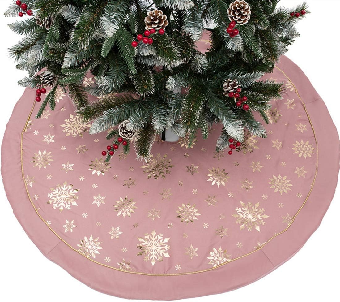 Pale pink Christmas tree skirt with gold snowflake pattern